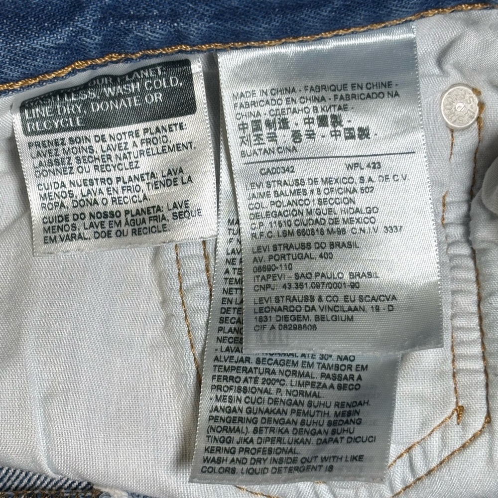 Levi's Classic Blue Ripped Jean Shorts - Picture 7 of 14